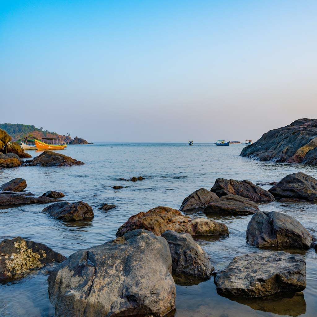 Gokarna, Karnataka: For those seeking an adventurous beach vacation, Gokarna offers a perfect blend of tranquility and excitement. With its pristine beaches and laid-back atmosphere, it's a surfer's paradise. Catch some waves, jet ski, take a ride on a banana boat or snorkel in the crystal clear waters. If you're up for an adventure, take the scenic coastal hike from Gokarna to Om Beach, crossing breathtaking cliffs and remote stretches of coastline.